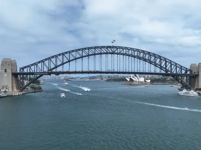 Ferries crossing under the Sydney Harbour Bridge