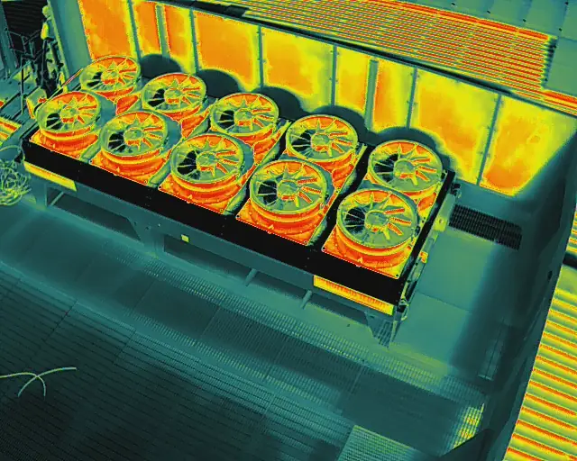Thermal view of a condenser bank in front of warm wall cladding