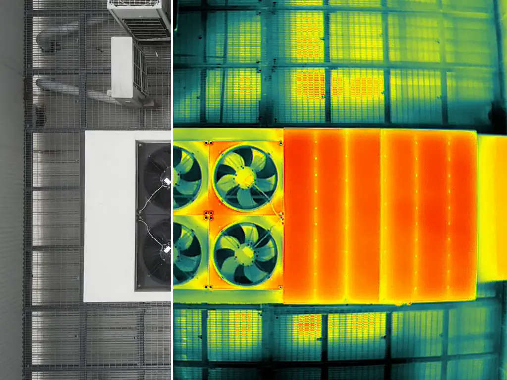 Rooftop condensers in visual and thermal, with a slider between the two views